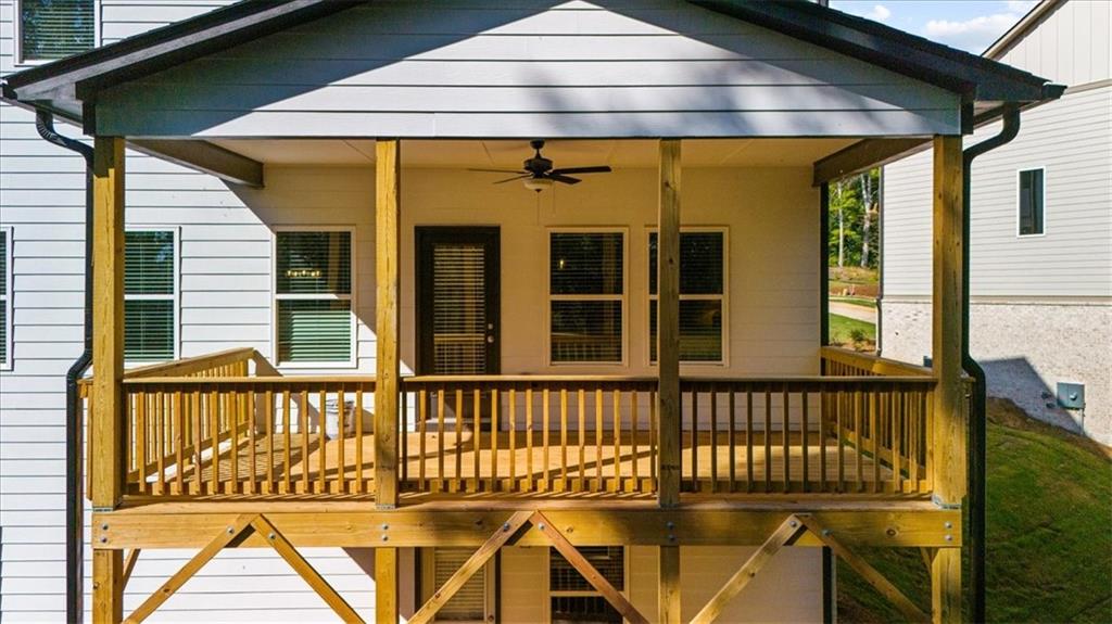 8620 Standing Stone Ball Ground, GA 30107 - Photo 50 of 61 a front view of a house with a balcony