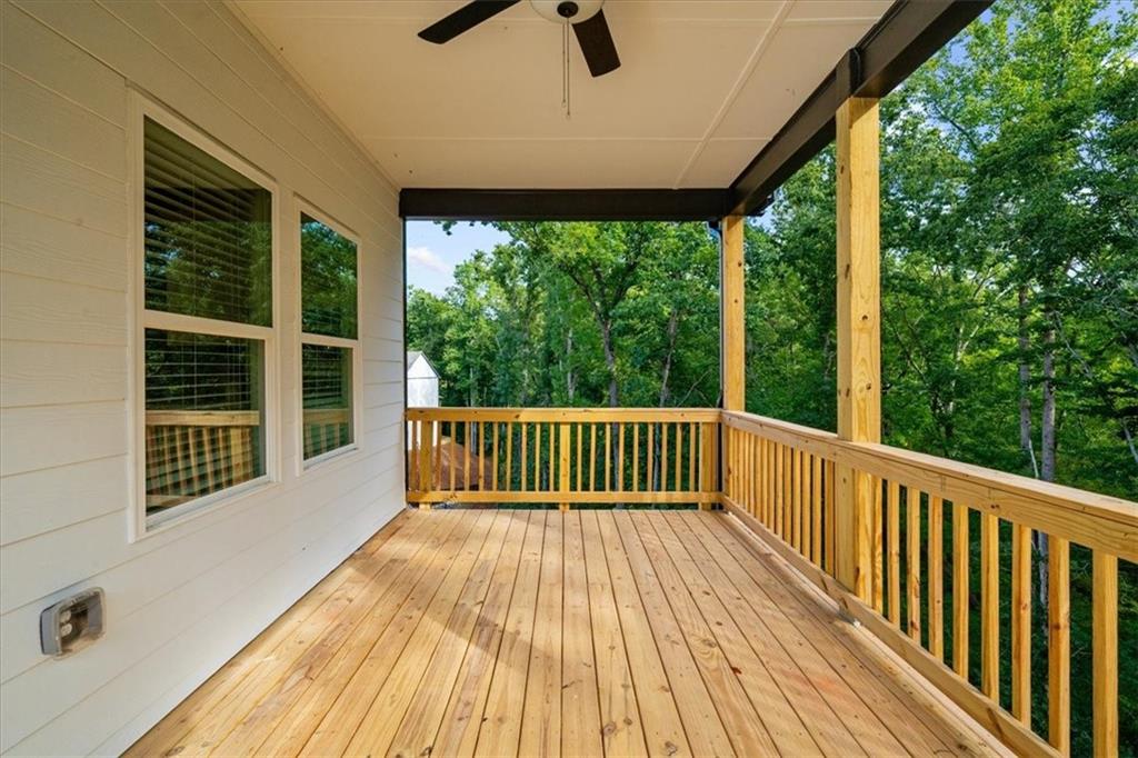 8620 Standing Stone Ball Ground, GA 30107 - Photo 51 of 61 a view of balcony with wooden floor