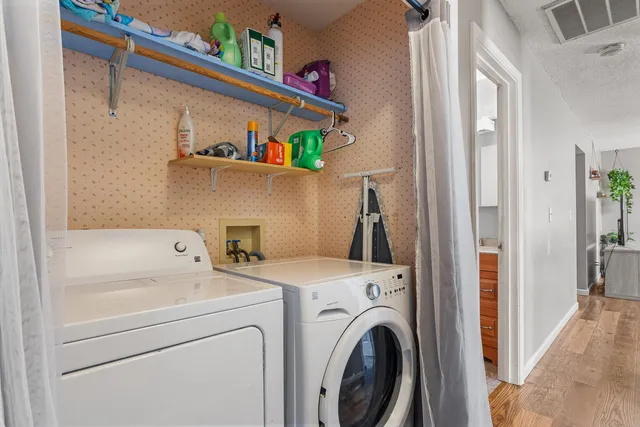 a utility room with dryer and washer