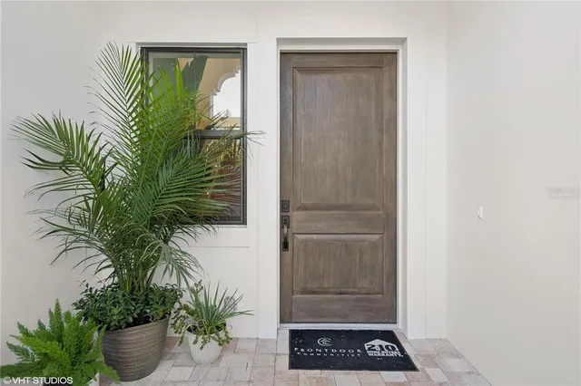 a view of entryway with wooden floor