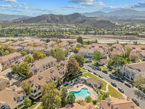 an aerial view of residential building with outdoor space