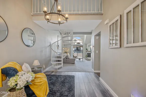 a view of entryway with livingroom and furniture