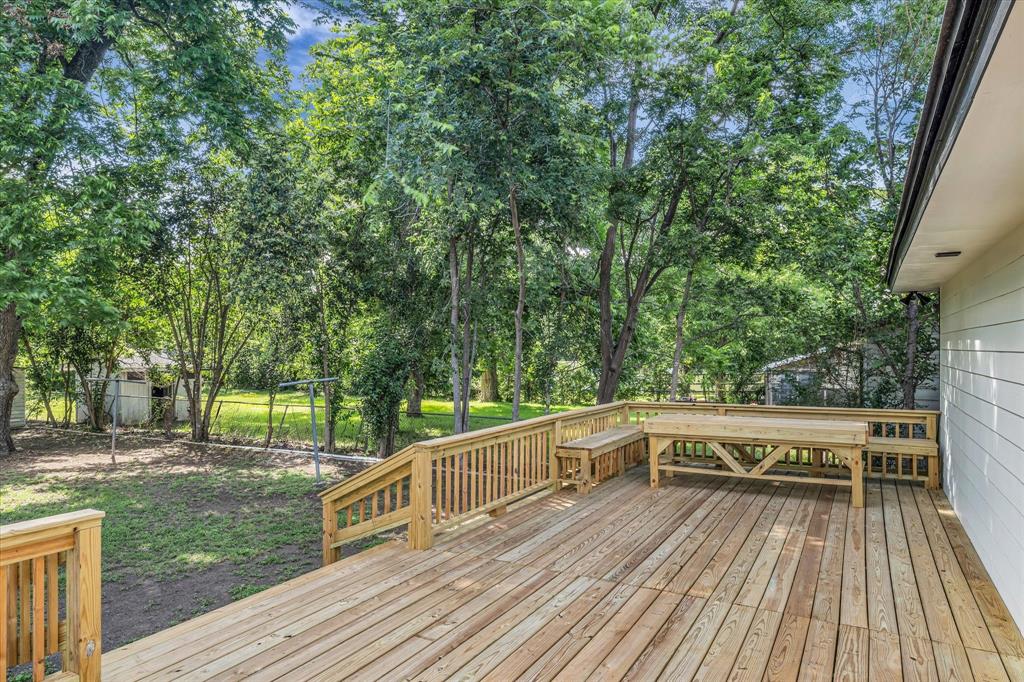 3608 North 26th Street Waco, TX 76708 - Photo 23 of 28 a view of a balcony with wooden floor and fence