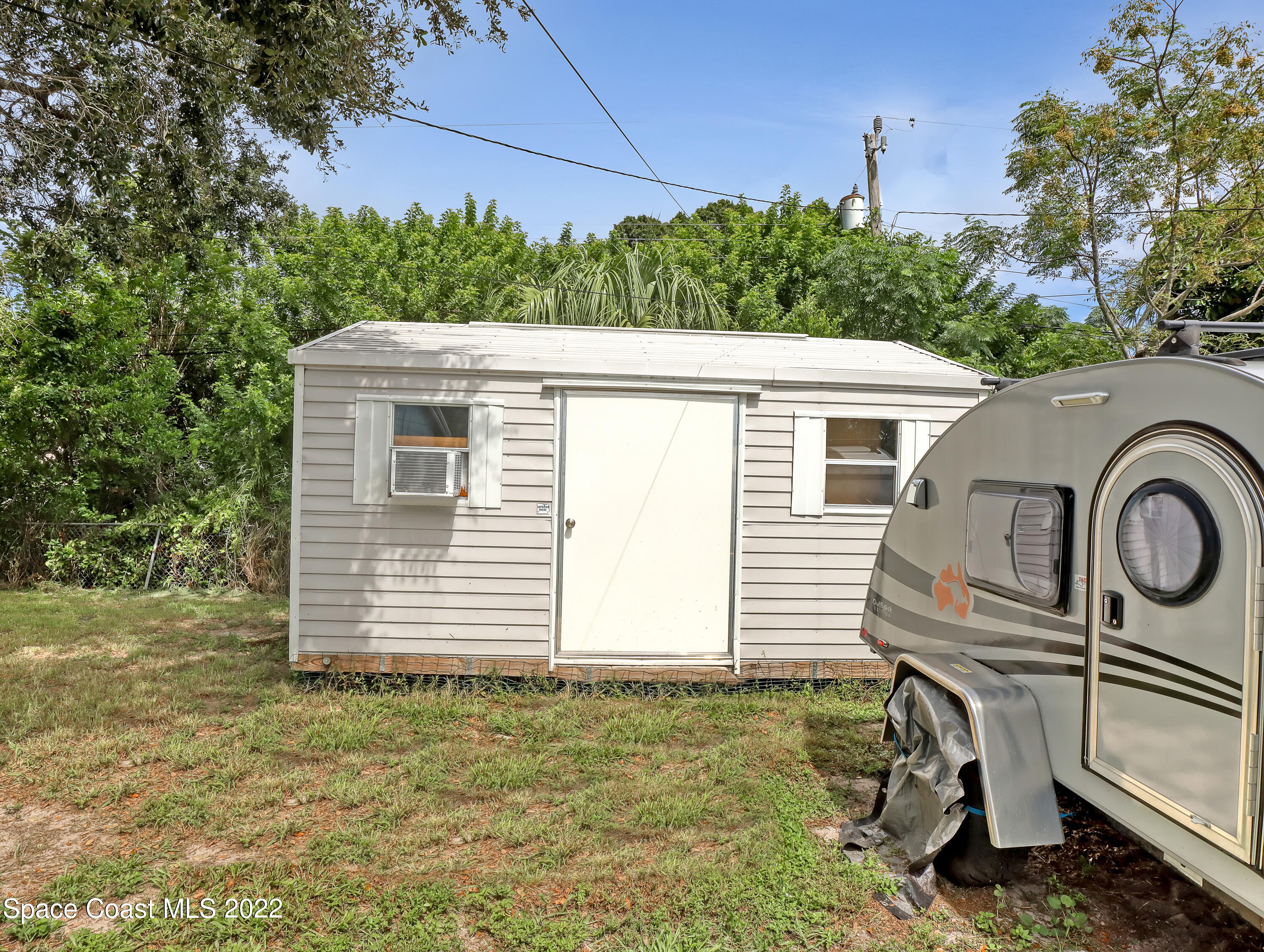 2156 King Richard Road Melbourne, FL 32935 - Photo 28 of 28 a house view with a backyard space