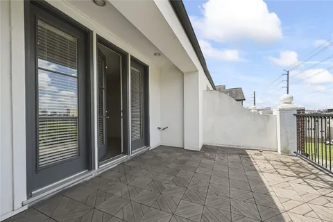 a view of a balcony with an outdoor space