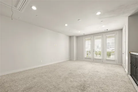 a spacious bathroom with a granite countertop tub sink shower and mirror