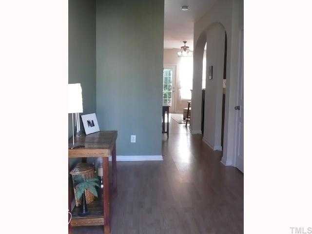 4355 Sugarbend Way Raleigh, NC 27606 - Photo 8 of 12 Large entry/foyer w/ great view of decorative archway to kitchen.