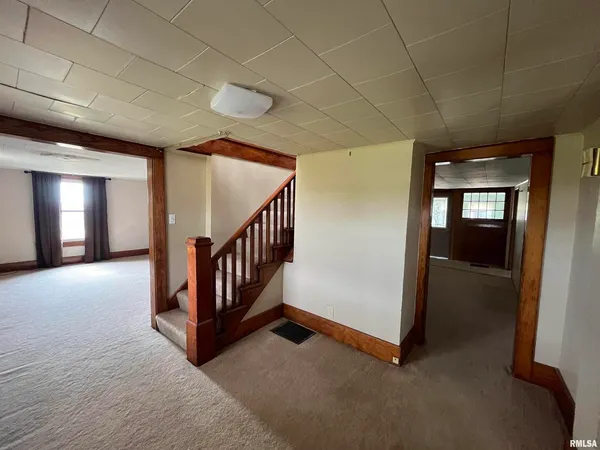 a view of a livingroom with a staircase