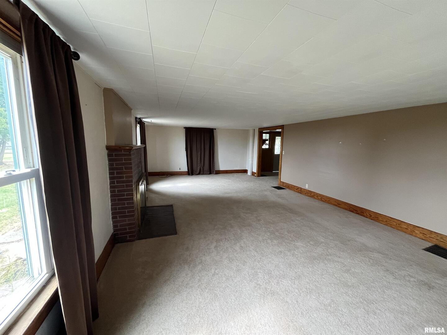2283 East 2750th Street Kewanee, IL 61443 - Photo 12 of 58 a view of a livingroom with a staircase
