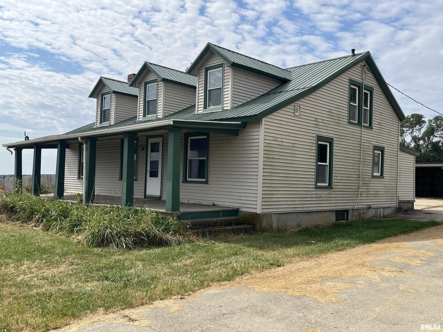 2283 East 2750th Street Kewanee, IL 61443 - Photo 2 of 58 a view of a house with a yard