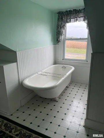 a backyard of a house with a yard and garage