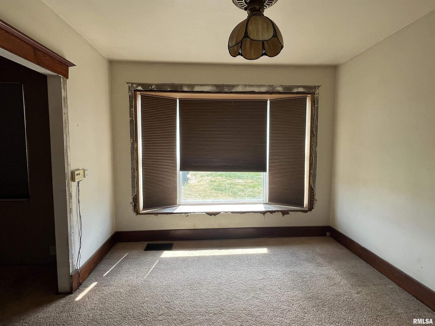 2283 East 2750th Street Kewanee, IL 61443 - Photo 41 of 58 a view of an empty room with a window
