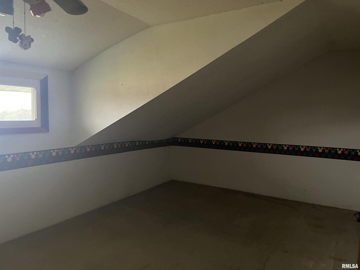 2283 East 2750th Street Kewanee, IL 61443 - Photo 51 of 58 a view of a room with wooden floor and white walls