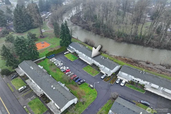 an aerial view of a house with a garden
