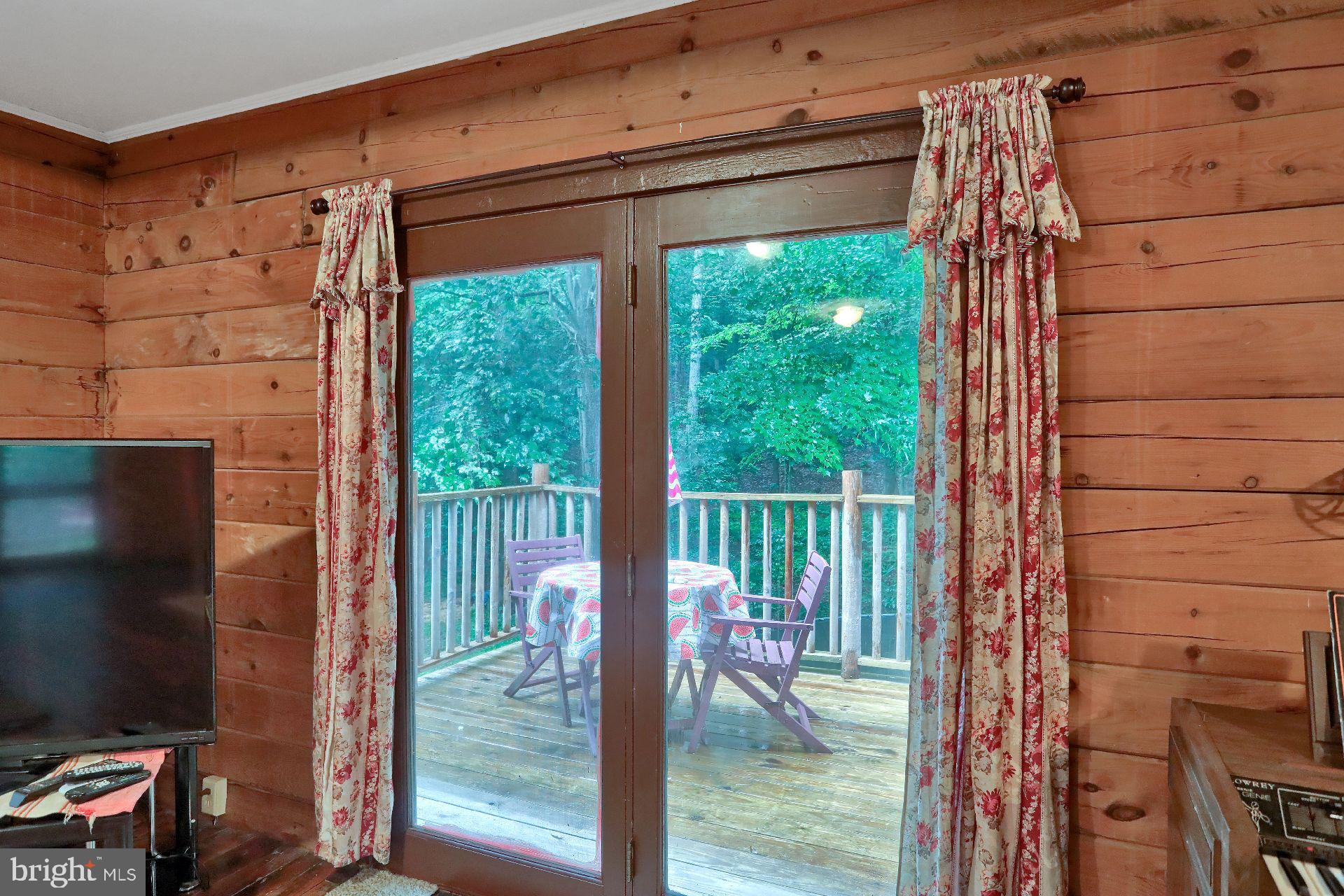 304 Paws Path Road Millerstown, PA 17062 - Photo 26 of 48 One of two porches off Family Room