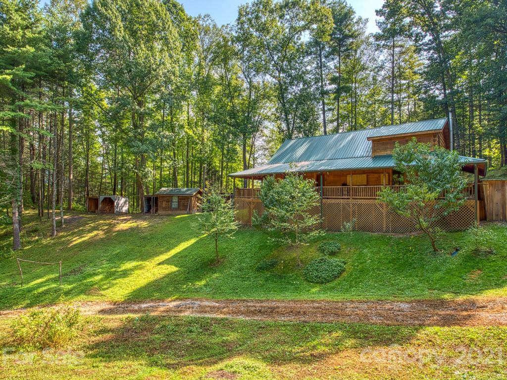 57 Dicks Br Road Clyde, NC 28721 - Photo 1 of 24 a view of a backyard