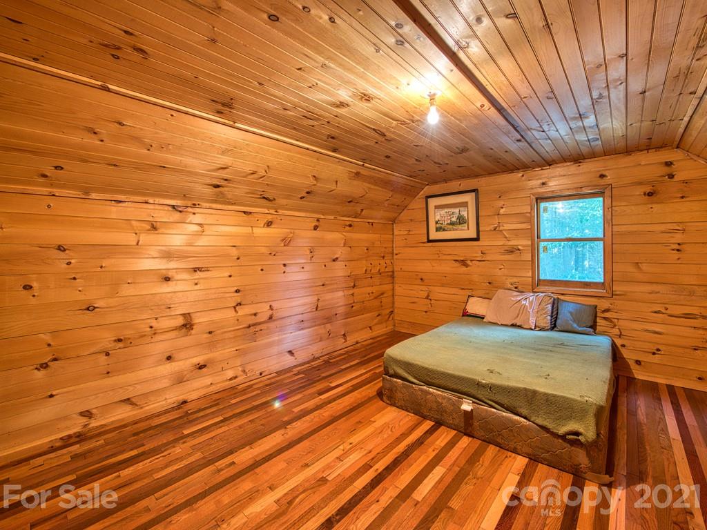 57 Dicks Br Road Clyde, NC 28721 - Photo 22 of 24 a view of a room with wooden floor