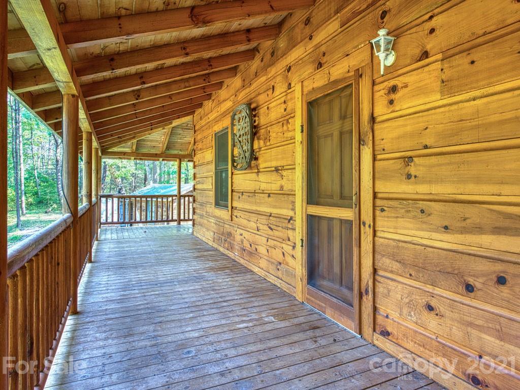 57 Dicks Br Road Clyde, NC 28721 - Photo 7 of 24 a view of walk in balcony with wooden floor