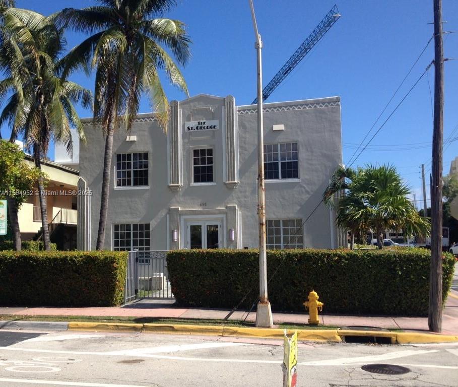 605 Euclid Avenue, Unit 103 Miami Beach, FL 33139 - Photo 2 of 8 a view of a house with a swimming pool