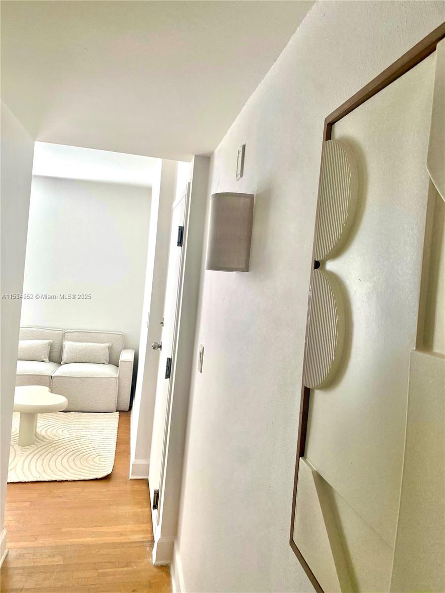 605 Euclid Avenue, Unit 103 Miami Beach, FL 33139 - Photo 6 of 8 a bathroom with a mirror