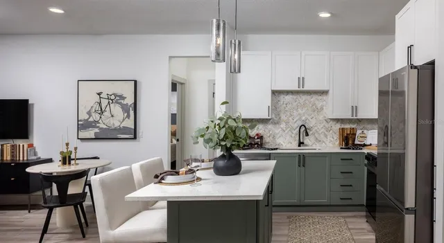 a view of a dining room with furniture