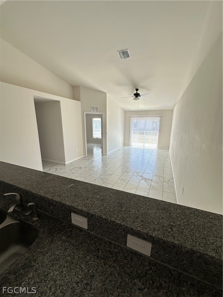 252 Southwest 3rd Street Cape Coral, FL 33991 - Photo 4 of 16 a view of entryway and hall with wooden floor