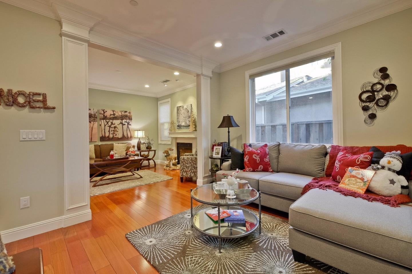 10310 Moretti Drive Cupertino, CA 95014 - Photo 12 of 31 a living room with furniture and wooden floor