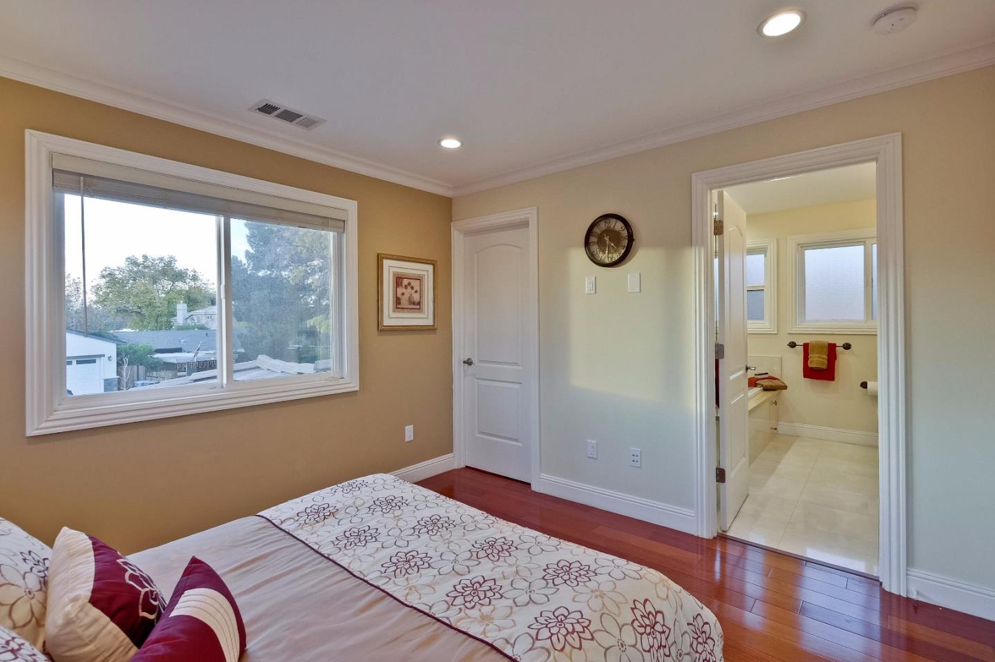 10310 Moretti Drive Cupertino, CA 95014 - Photo 14 of 31 a bedroom with a bed and a window
