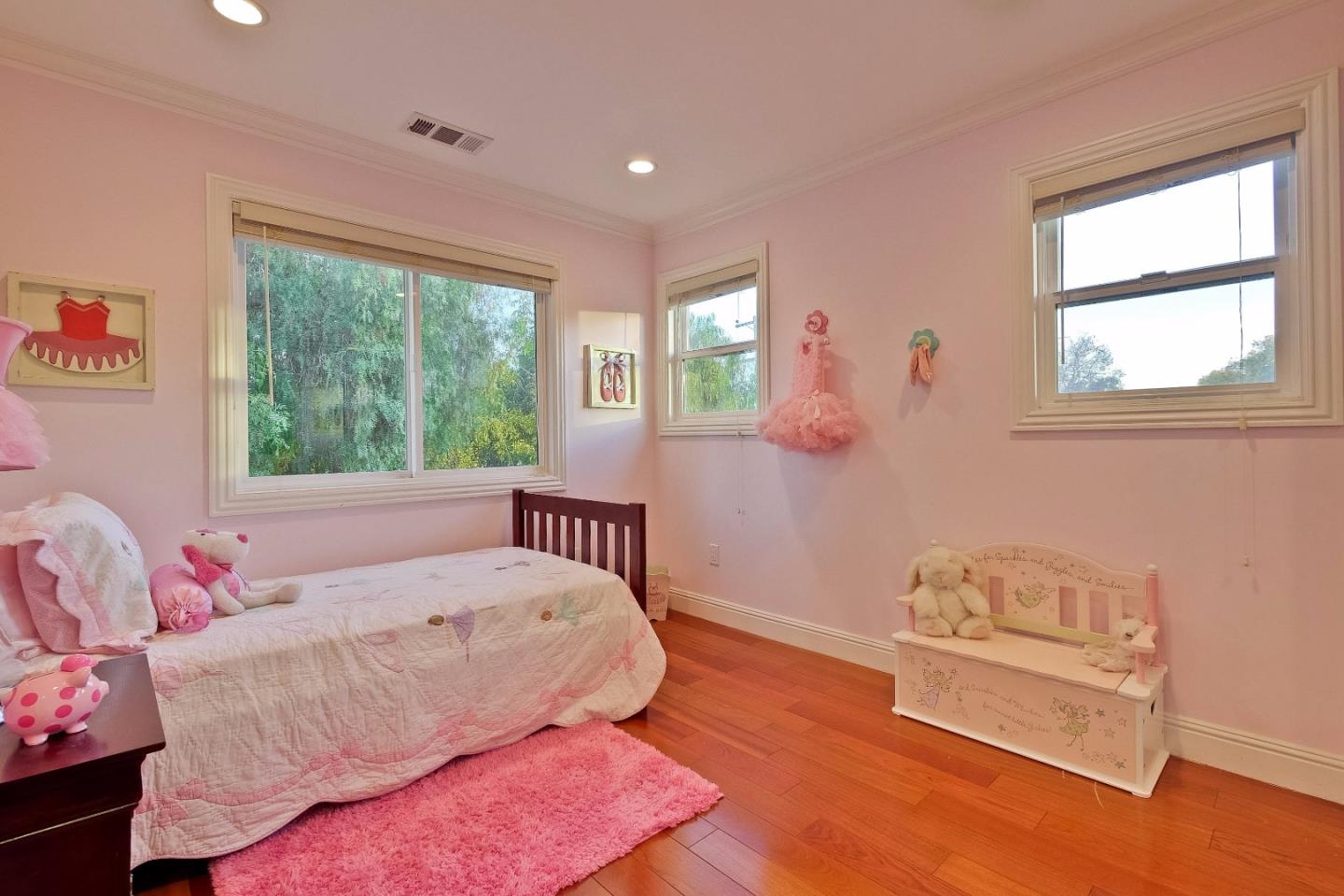 10310 Moretti Drive Cupertino, CA 95014 - Photo 17 of 31 a bedroom with a bed and a window