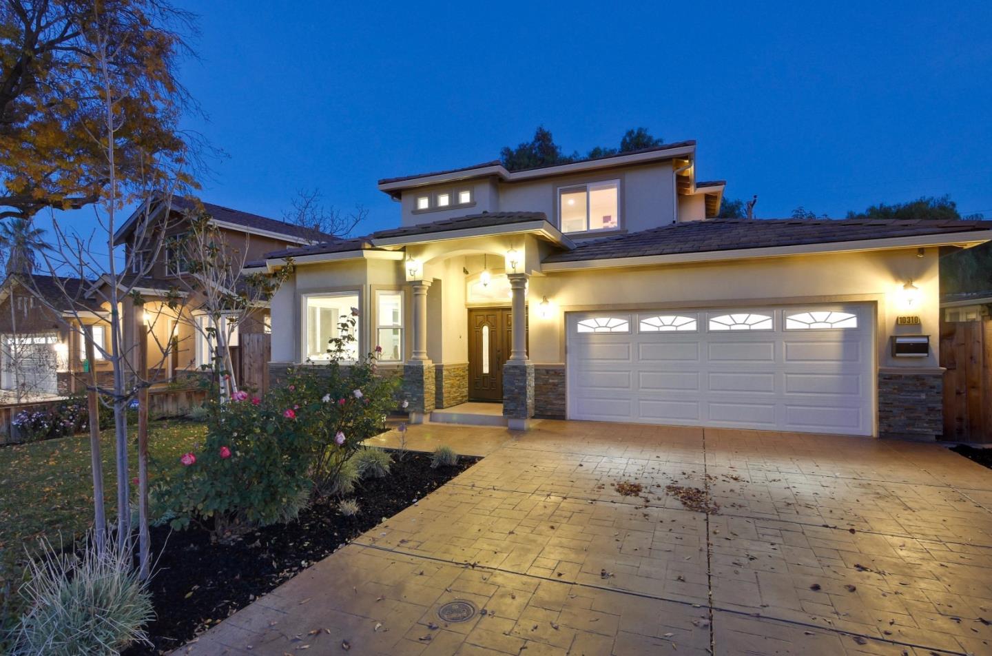 10310 Moretti Drive Cupertino, CA 95014 - Photo 2 of 31 a view of a house with a garage