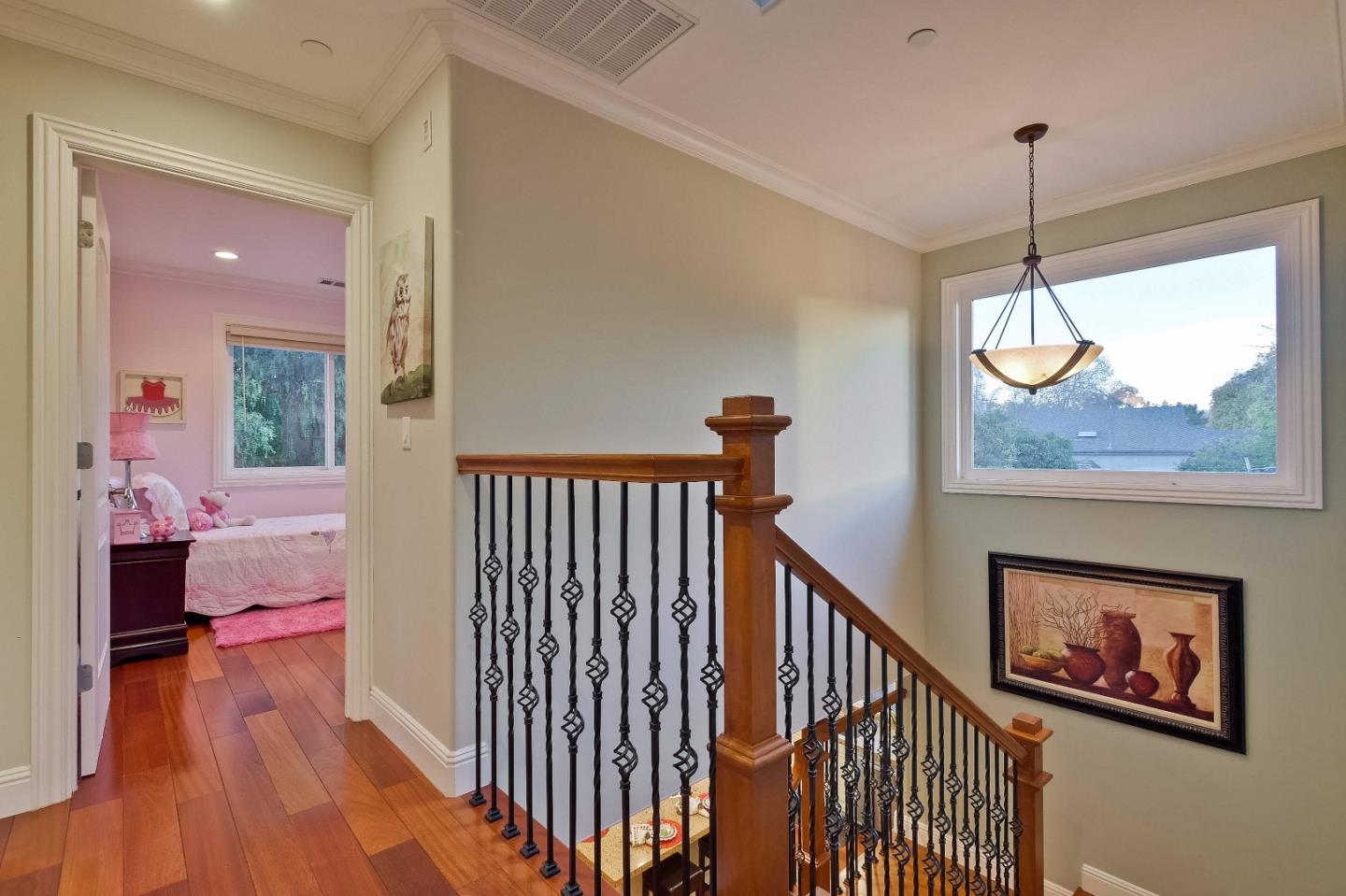 10310 Moretti Drive Cupertino, CA 95014 - Photo 22 of 31 a bedroom with furniture and a window