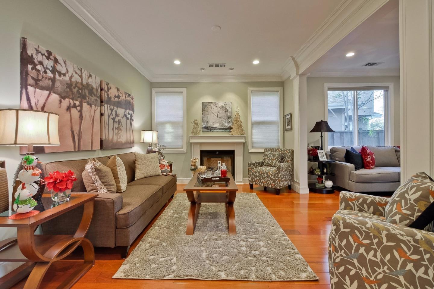 10310 Moretti Drive Cupertino, CA 95014 - Photo 3 of 31 a living room with furniture fireplace and rug