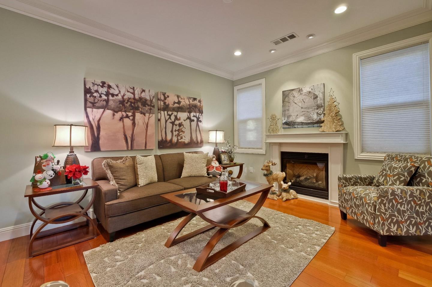 10310 Moretti Drive Cupertino, CA 95014 - Photo 4 of 31 a living room with furniture and a fireplace