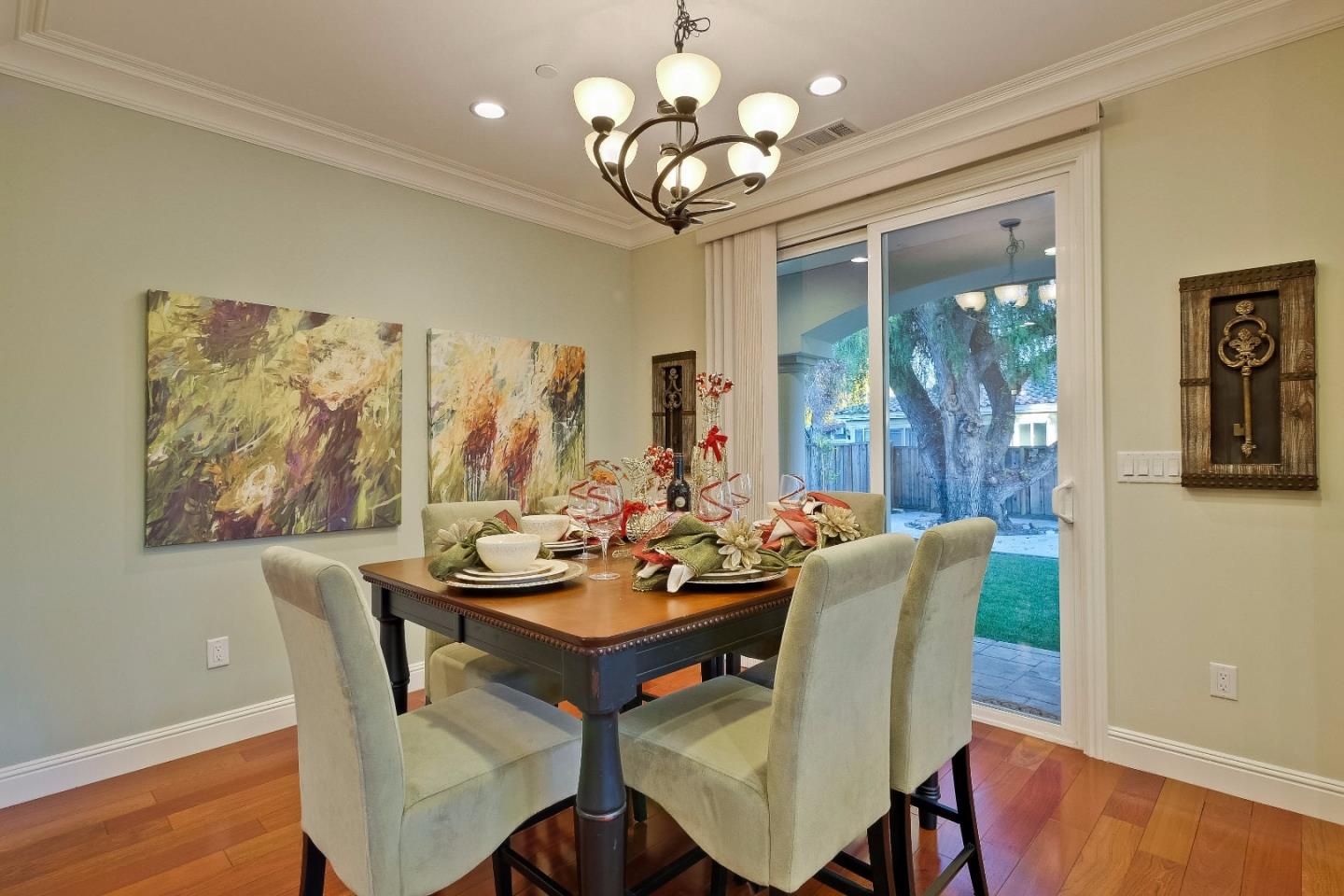10310 Moretti Drive Cupertino, CA 95014 - Photo 8 of 31 a view of a dining room with furniture window and wooden floor