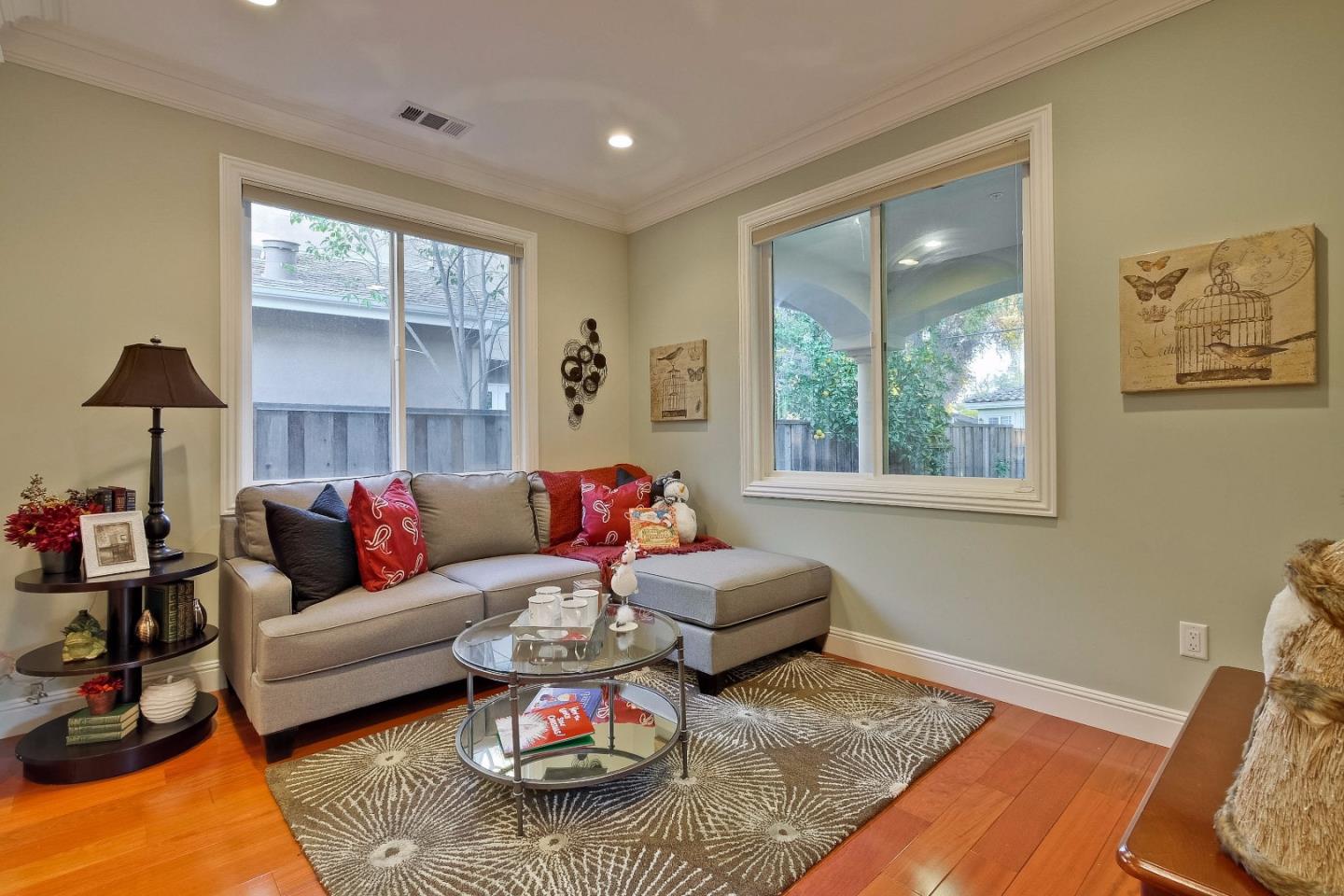 10310 Moretti Drive Cupertino, CA 95014 - Photo 10 of 31 a living room with furniture and a window