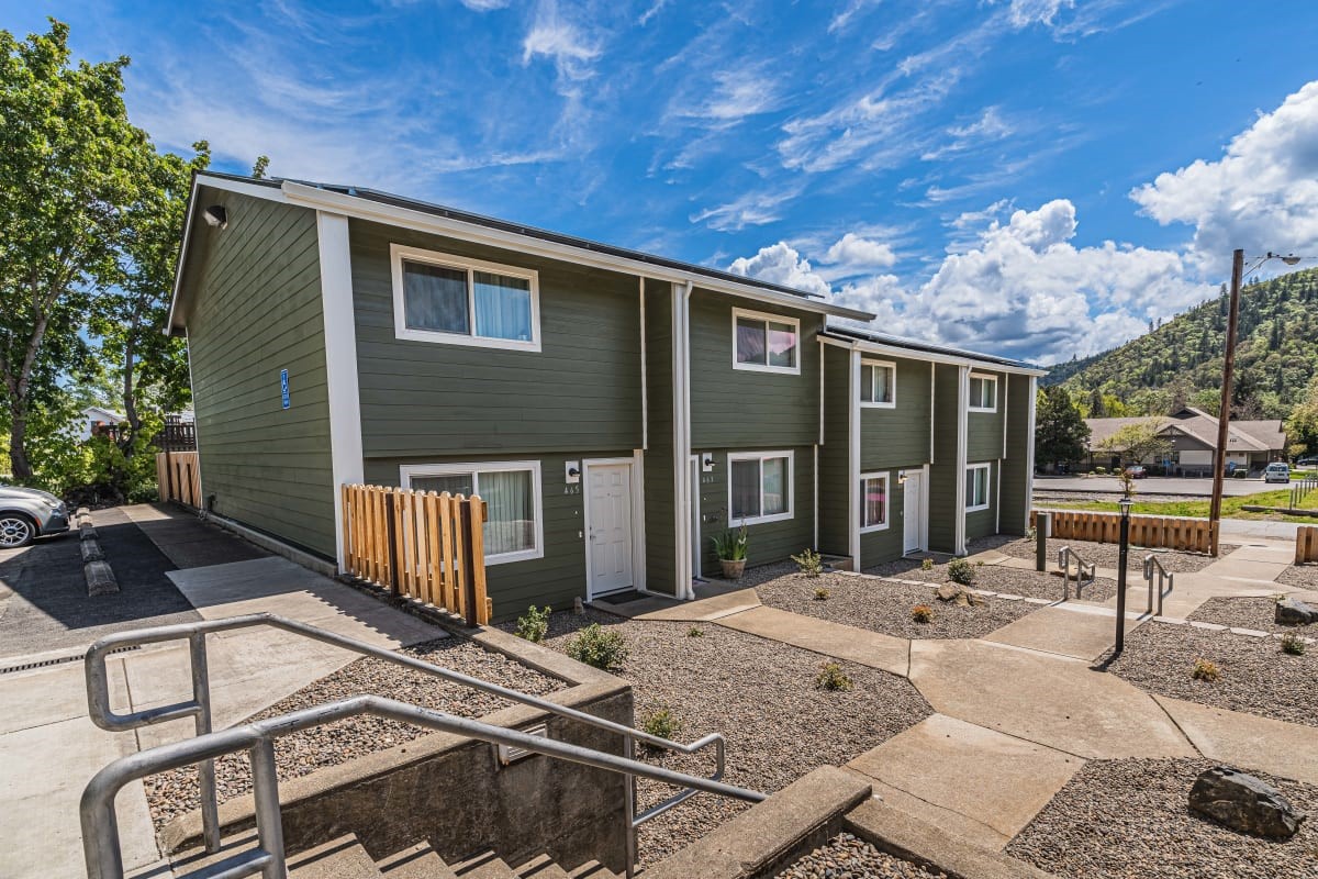 459 4th Avenue Gold Hill, OR 97525 - Photo 2 of 6 a view of a house with backyard porch and sitting area