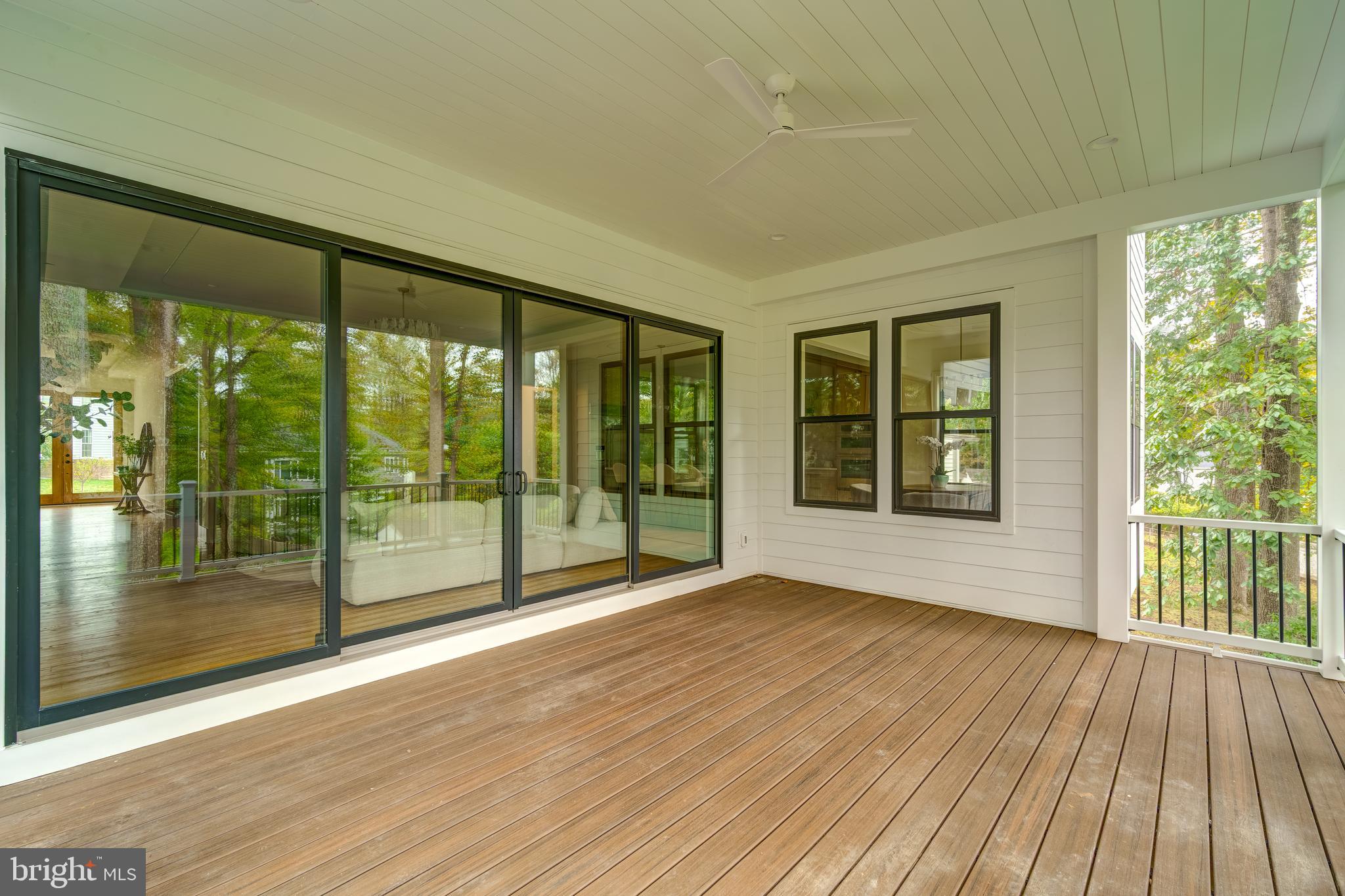 913 Symphony Circle Southwest Vienna, VA 22180 - Photo 138 of 150 a view of empty room with wooden floor and fan