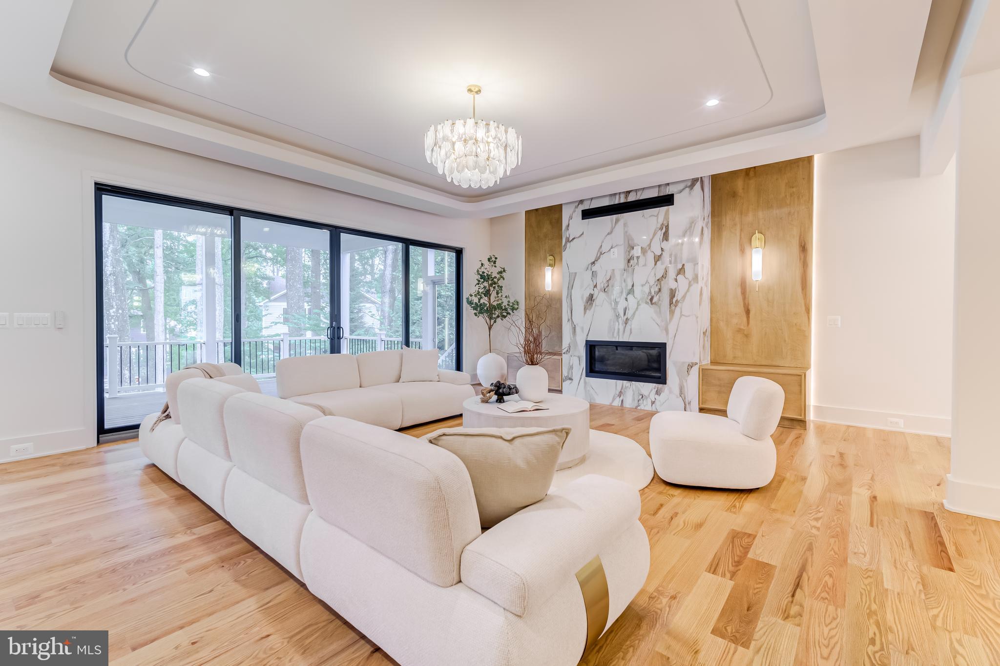 913 Symphony Circle Southwest Vienna, VA 22180 - Photo 31 of 150 a living room with fireplace furniture and a large window