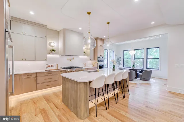 a kitchen with a stove and a shower