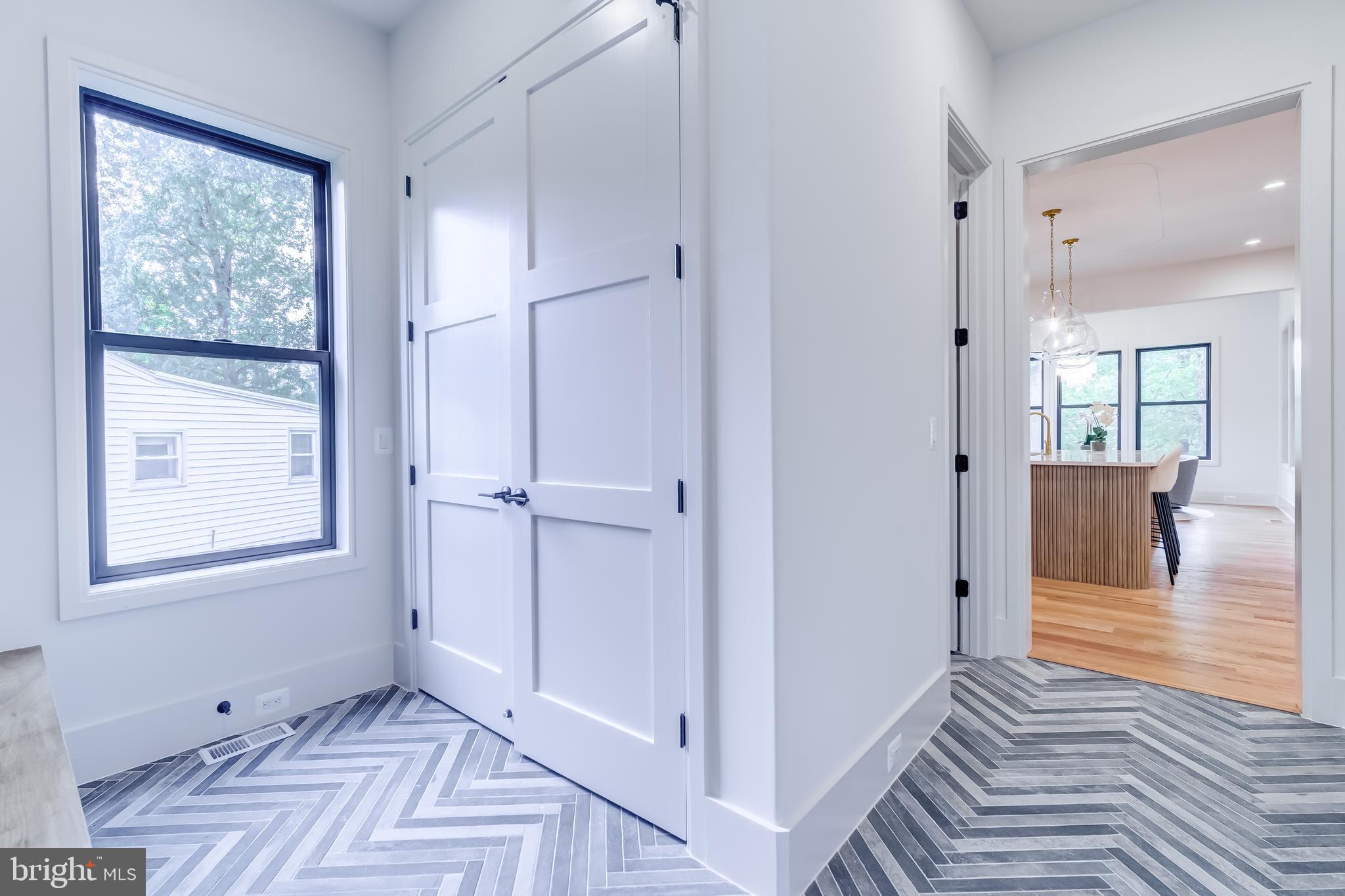 913 Symphony Circle Southwest Vienna, VA 22180 - Photo 51 of 150 a view of a livingroom with wooden floor and a bathroom