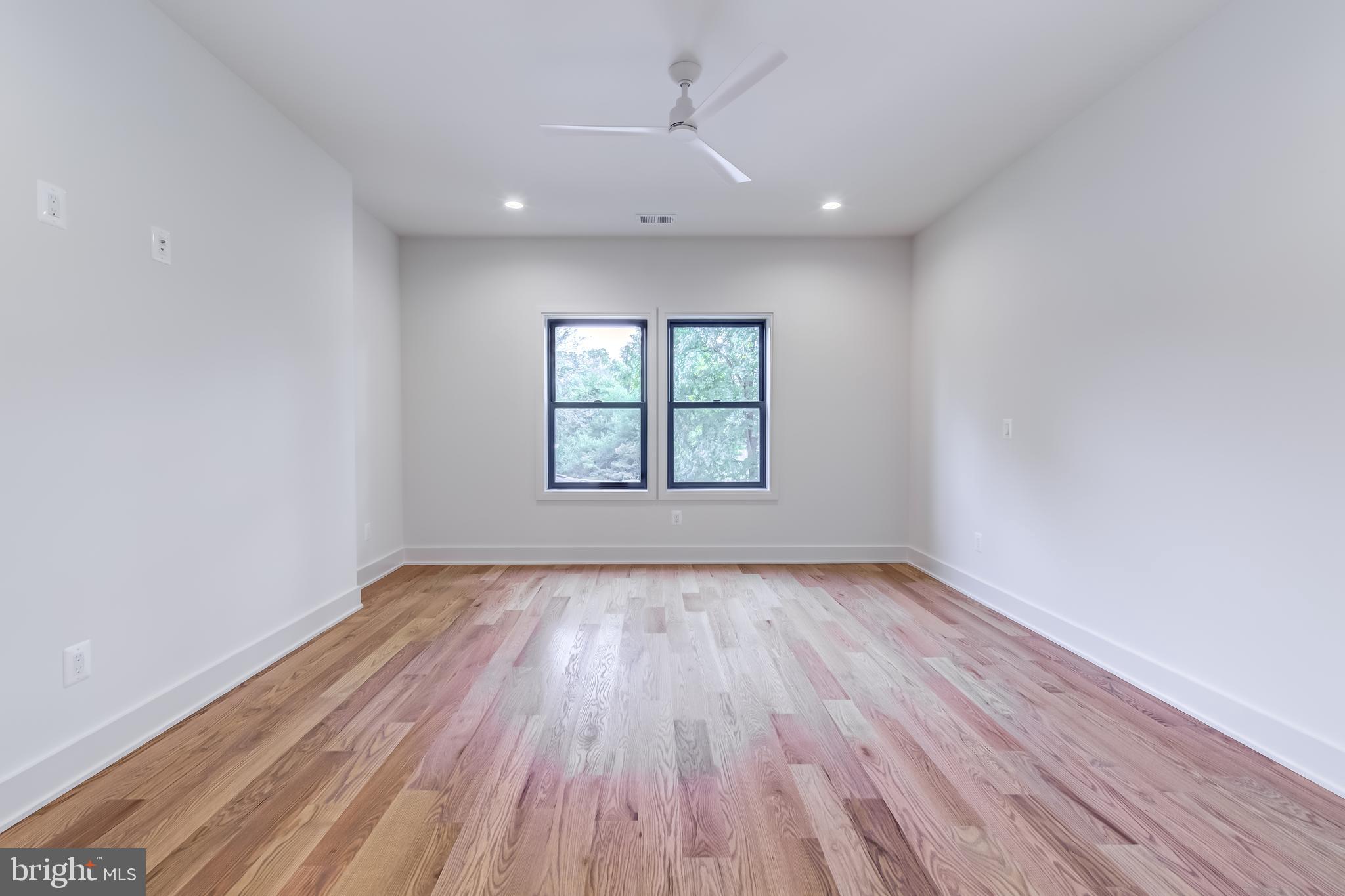 913 Symphony Circle Southwest Vienna, VA 22180 - Photo 74 of 150 wooden floor in an empty room with a window