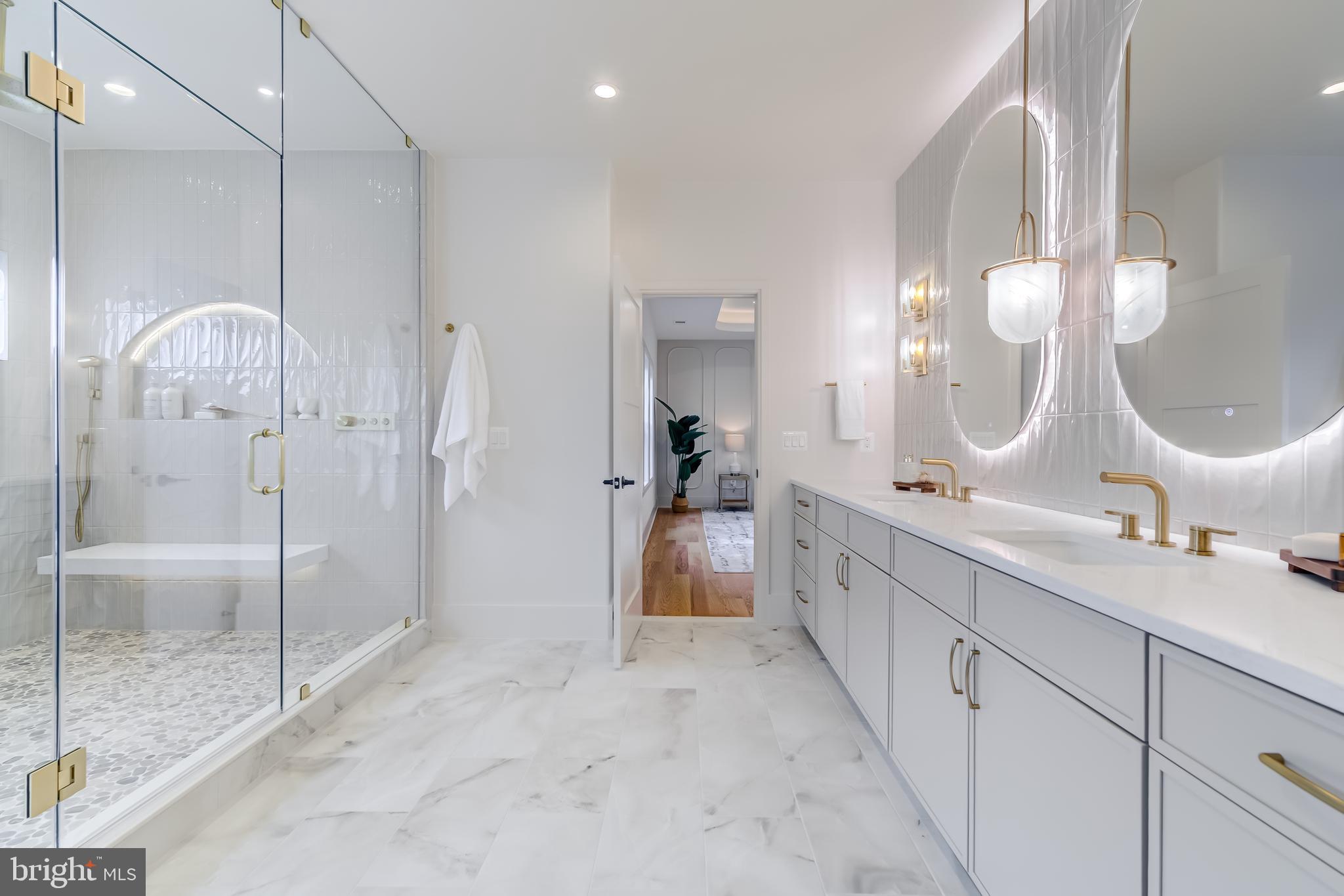 913 Symphony Circle Southwest Vienna, VA 22180 - Photo 98 of 150 a spacious bathroom with a double vanity sink mirror and shower