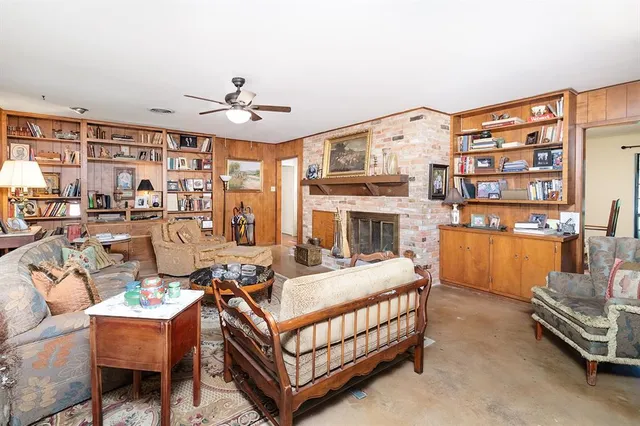 a very nice looking living room with a large window