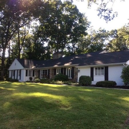 10 Ridgeway Circle Springfield, MA 01118 - Photo 1 of 29 a front view of a house with a garden