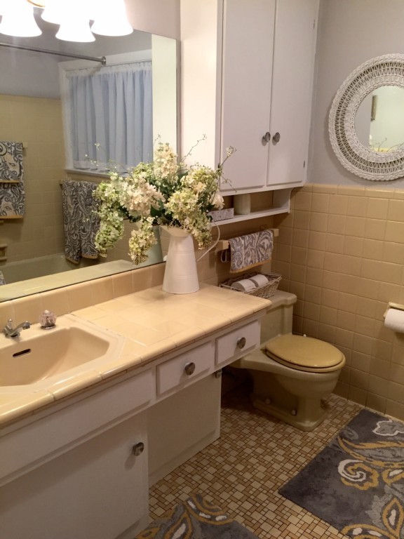 10 Ridgeway Circle Springfield, MA 01118 - Photo 16 of 29 a bathroom with a granite countertop toilet and a sink