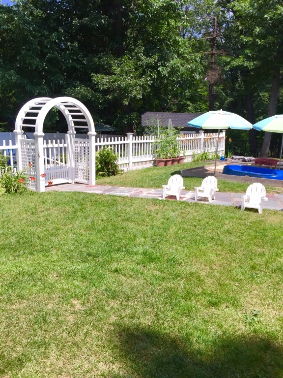10 Ridgeway Circle Springfield, MA 01118 - Photo 26 of 29 a view of swimming pool with deck and yard