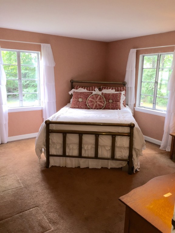 10 Ridgeway Circle Springfield, MA 01118 - Photo 10 of 29 a bedroom with a bed chair and a window