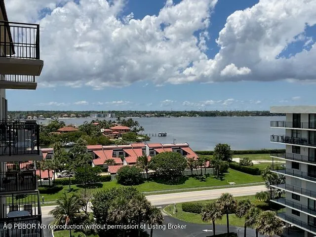 a room with gym equipment and a view of living room