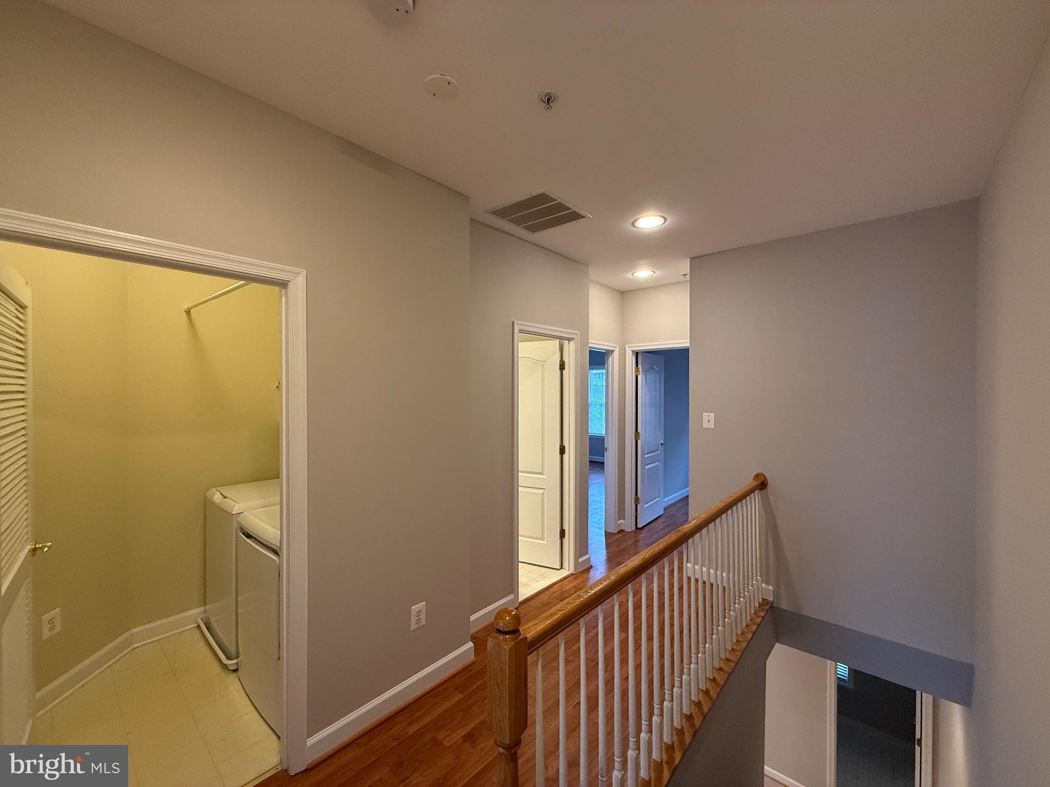 1127 Gaither Road Rockville, MD 20850 - Photo 21 of 26 a view of hallway with stairs