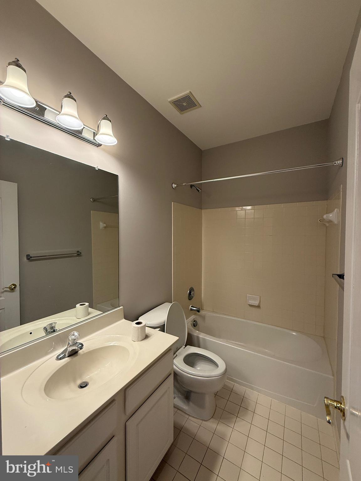 1127 Gaither Road Rockville, MD 20850 - Photo 22 of 26 a bathroom with a sink toilet and shower